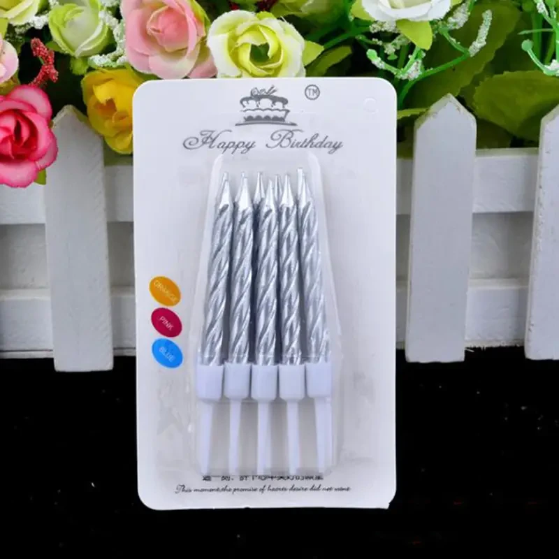Conjunto de 10 velas de cera Plateadas's foto | Dádiva |  BizneCubano