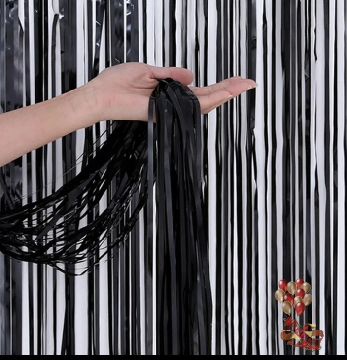 Cortina de fleco negra's foto | Dádiva |  BizneCubano