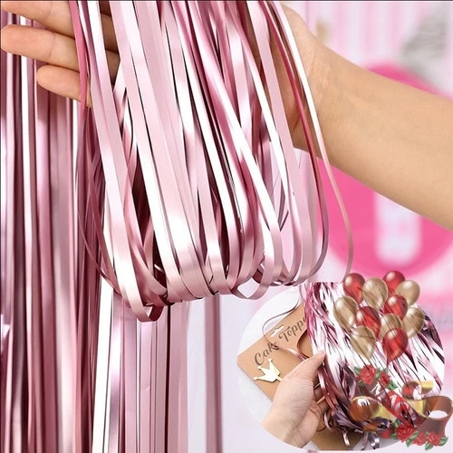 Cortina de fleco rosado claro's foto | Dádiva |  BizneCubano